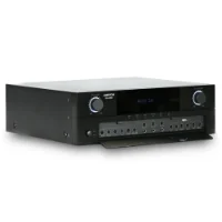 Angled view of Ampyon KA-500 karaoke mixing amplifier with fold-down front control panel, metal chassis design, and illuminated volume knobs