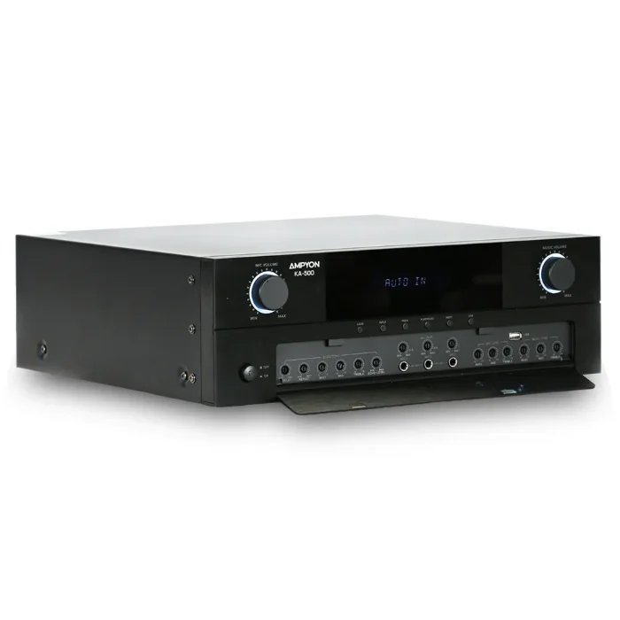 Angled view of Ampyon KA-500 karaoke mixing amplifier with fold-down front control panel, metal chassis design, and illuminated volume knobs