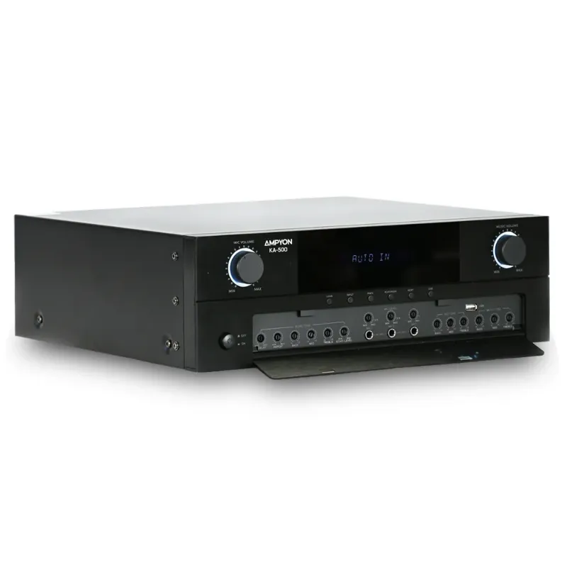 Angled view of Ampyon KA-500 karaoke mixing amplifier with fold-down front control panel, metal chassis design, and illuminated volume knobs