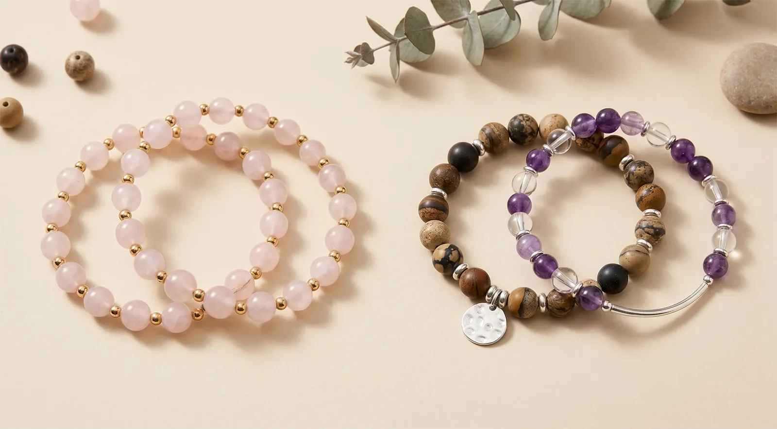 Matching bracelet pair and complementary bracelet pair arranged side by side on a beige tabletop