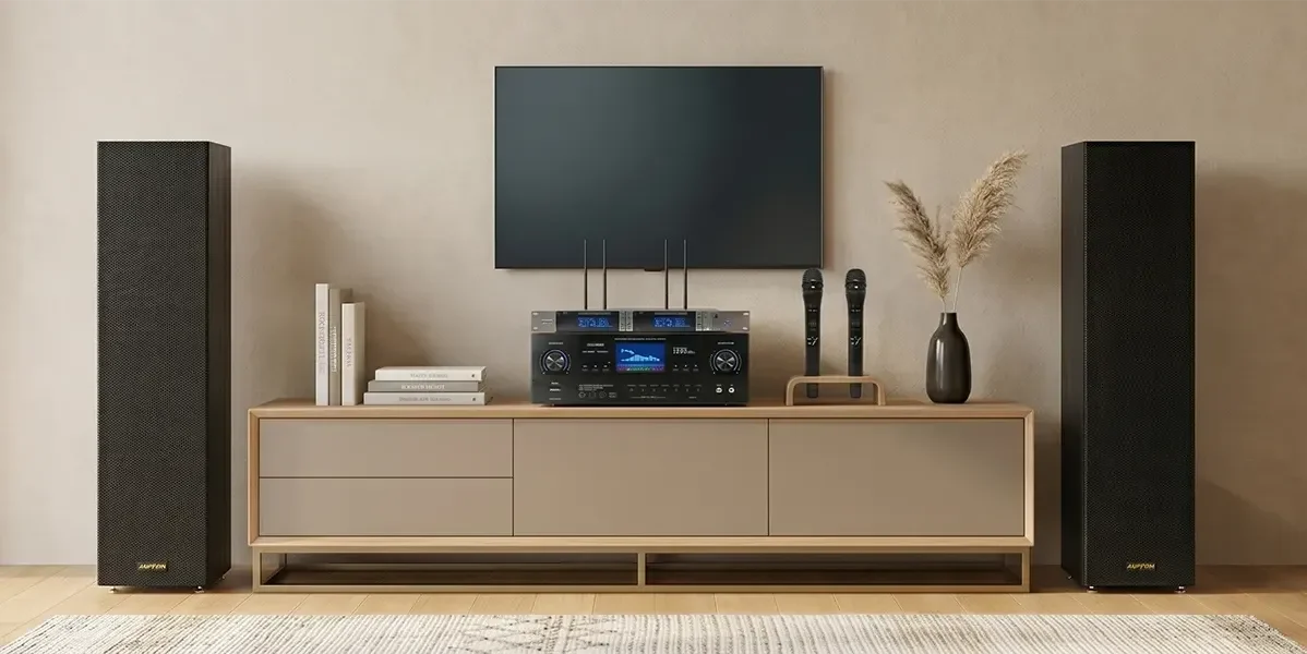 Home karaoke system with floor-standing speakers, amplifier, and wireless microphones
