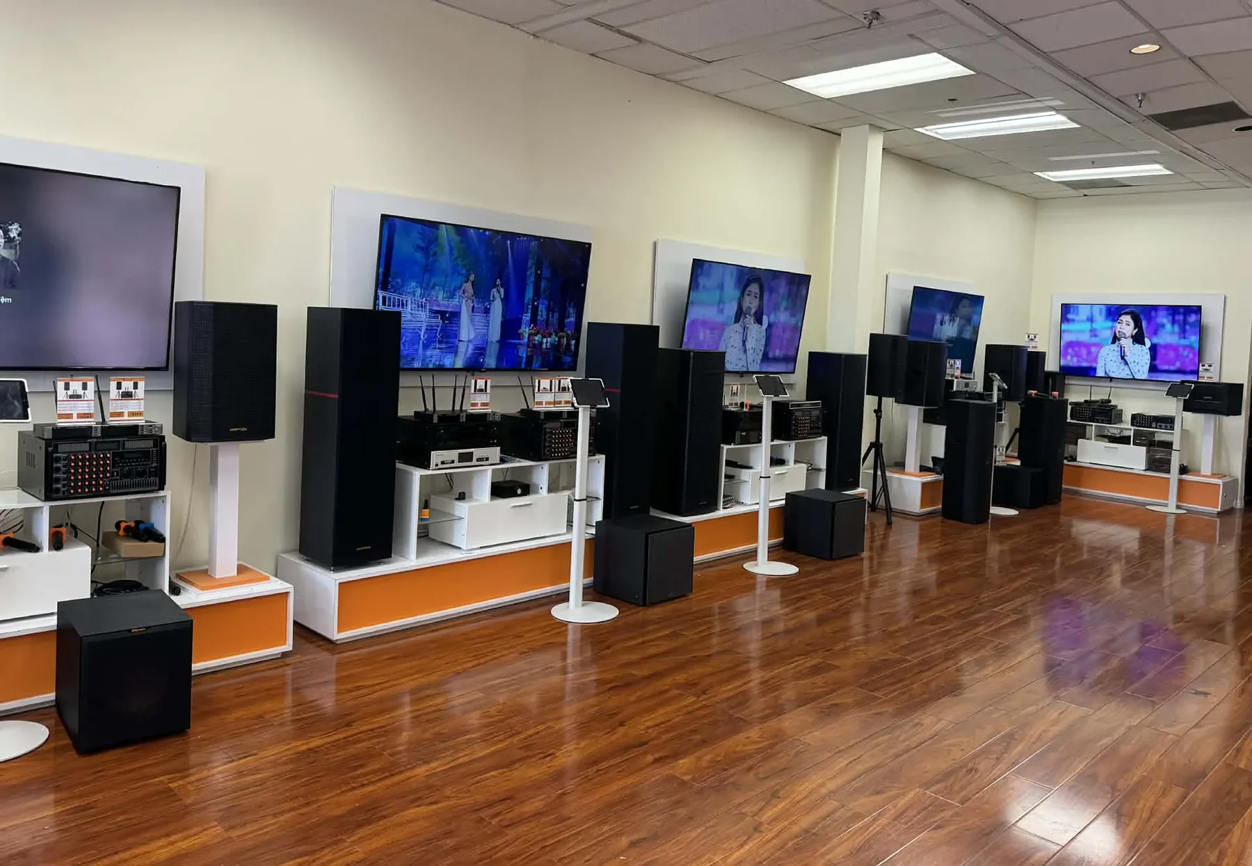 Home karaoke systems and speakers displayed inside Tittac’s Garden Grove showroom