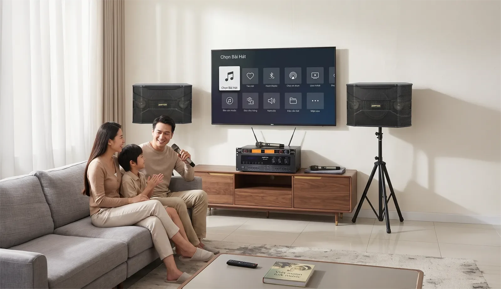 Ampyon AKS-302 compact analog karaoke system set up for a family karaoke night in a modern living room