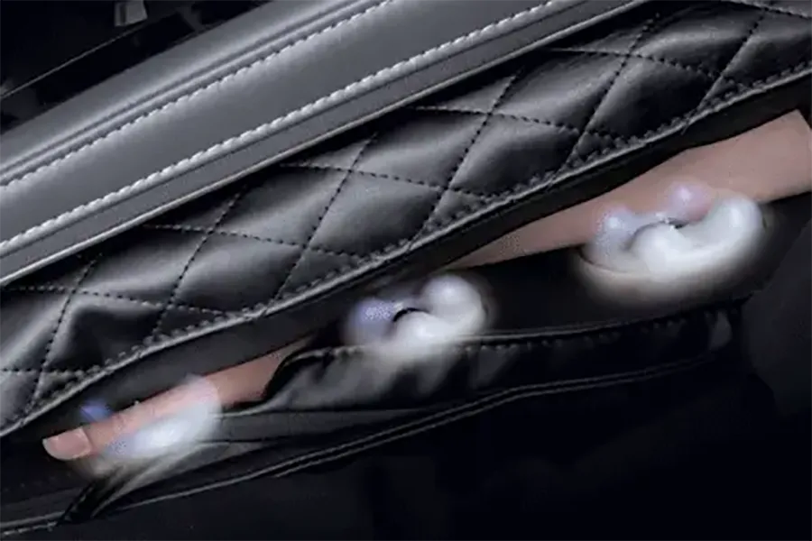 Three dedicated arm rollers inside the Osaki AI Vivo massage chair armrests