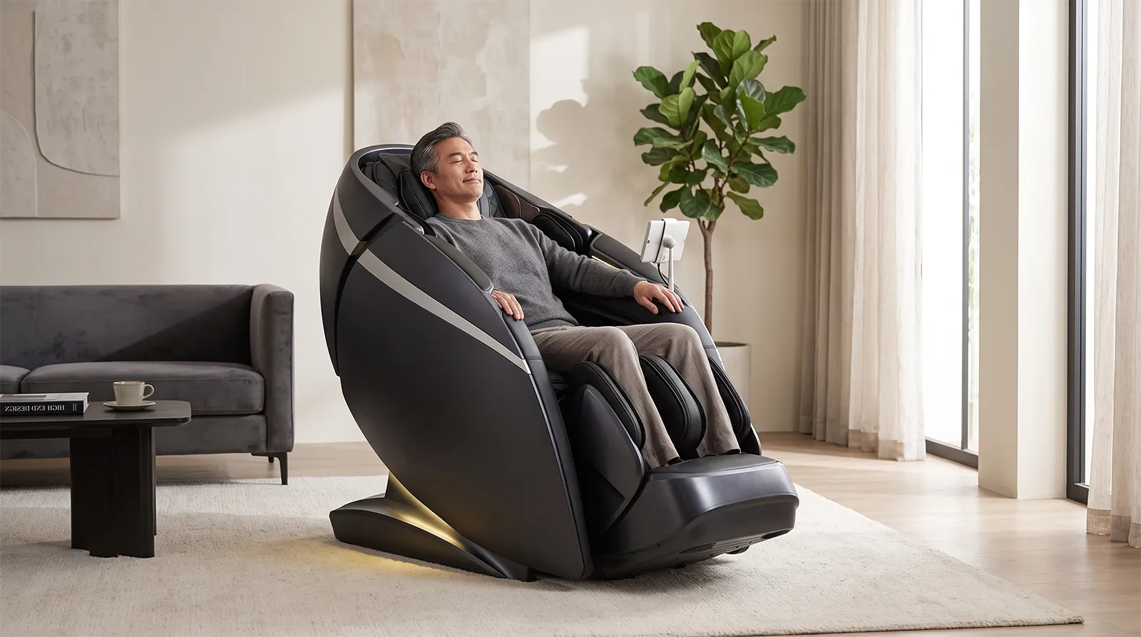Asian adult relaxing in the Osaki DuoMax massage chair in a modern premium living room
