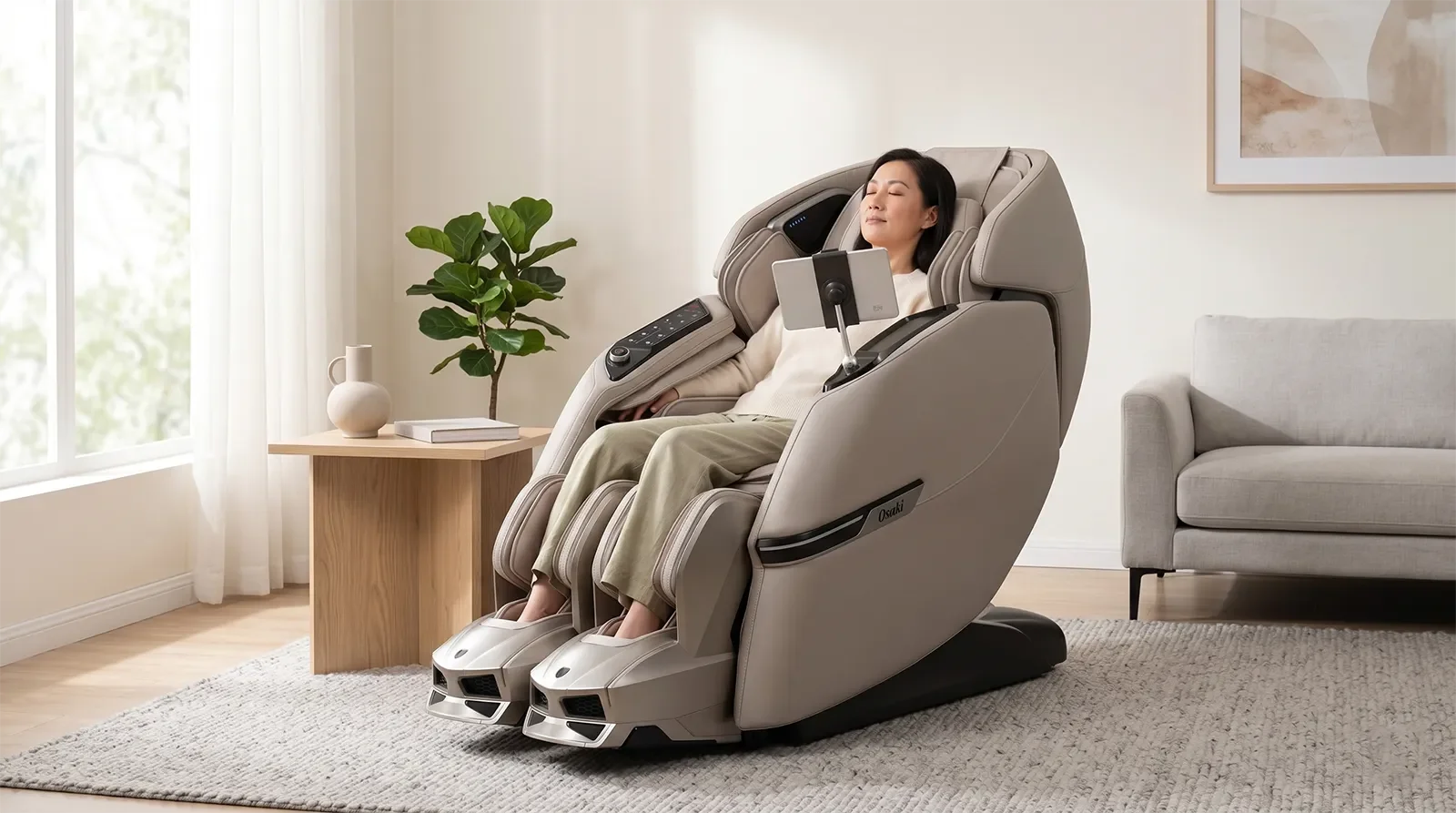 Asian adult relaxing in the Trion Flex Duo massage chair in a modern premium living room