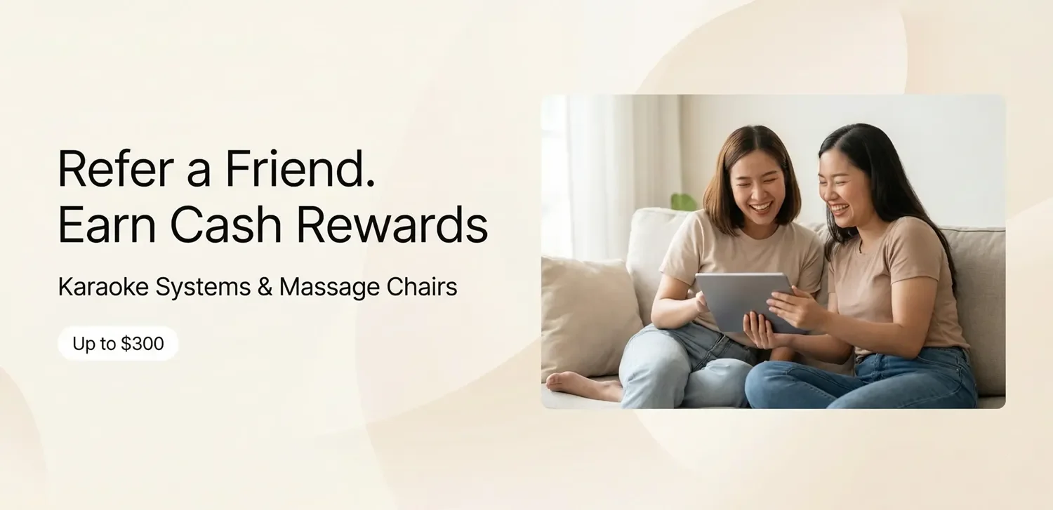 Tittac referral banner with two women on a sofa and cash rewards for karaoke systems and massage chairs.